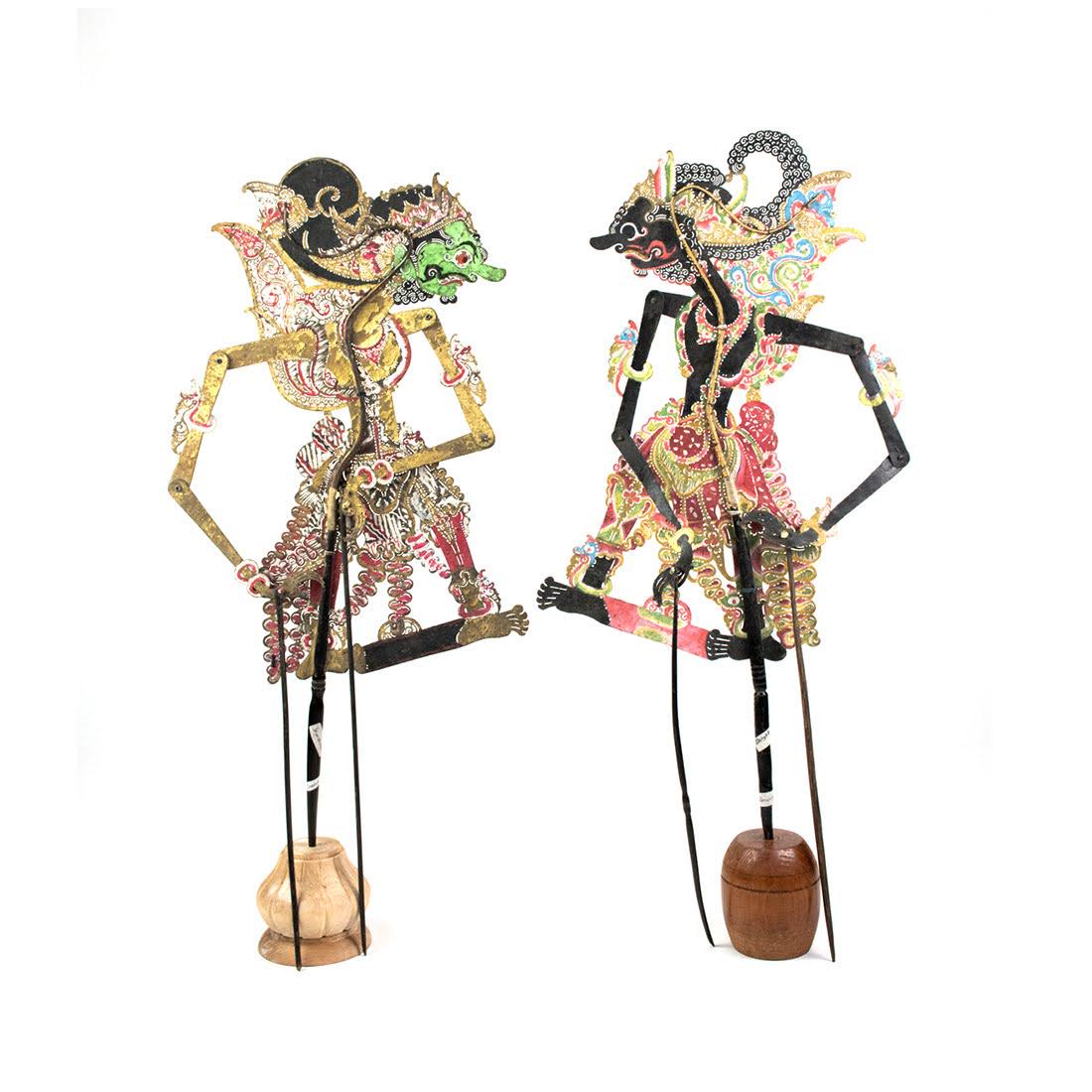 Two Indo Wayang Kulit Jayadrata & Gatot Kaea Puppets: A set of two Indonesian Wayang Kulit flat puppets intricately hand painted on leather hide representing characters Jayadrata (left) from Ceper c.1920, and Gatot Kaea (right) from Tegal c.1940. Each ar