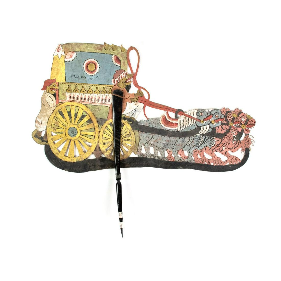 Indonesian Wayang Kulit Kereta Shadow Puppet: An Indonesian Wayang Kulit flat puppet intricately hand painted on leather hide depicting a kereta (carriage in Javanese) with two gold male figures on a small carriage being pulled by a pair of tiger