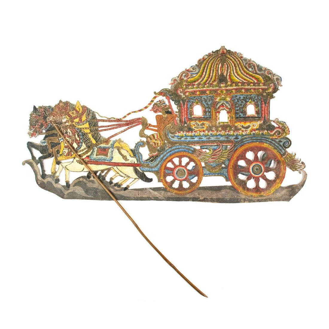 Indonesian Wayang Kulit Kereta Shadow Puppet: An Indonesian Wayang Kulit flat puppet intricately hand painted on leather hide depicting a kereta (carriage in Javanese) with a pink male figure on a large ornate carriage being pulled by three horse