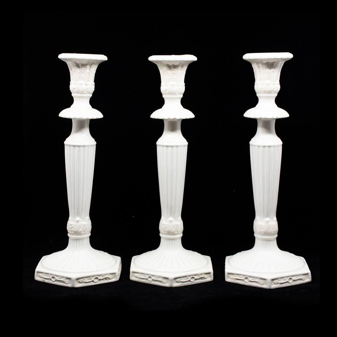 Set of 3 Butler's Pantry Tall Candlesticks by Lenox: A set of three Butler's Pantry tall candlesticks by Lenox having embossed and raised scrolling motifs throughout. Marked on the underside
