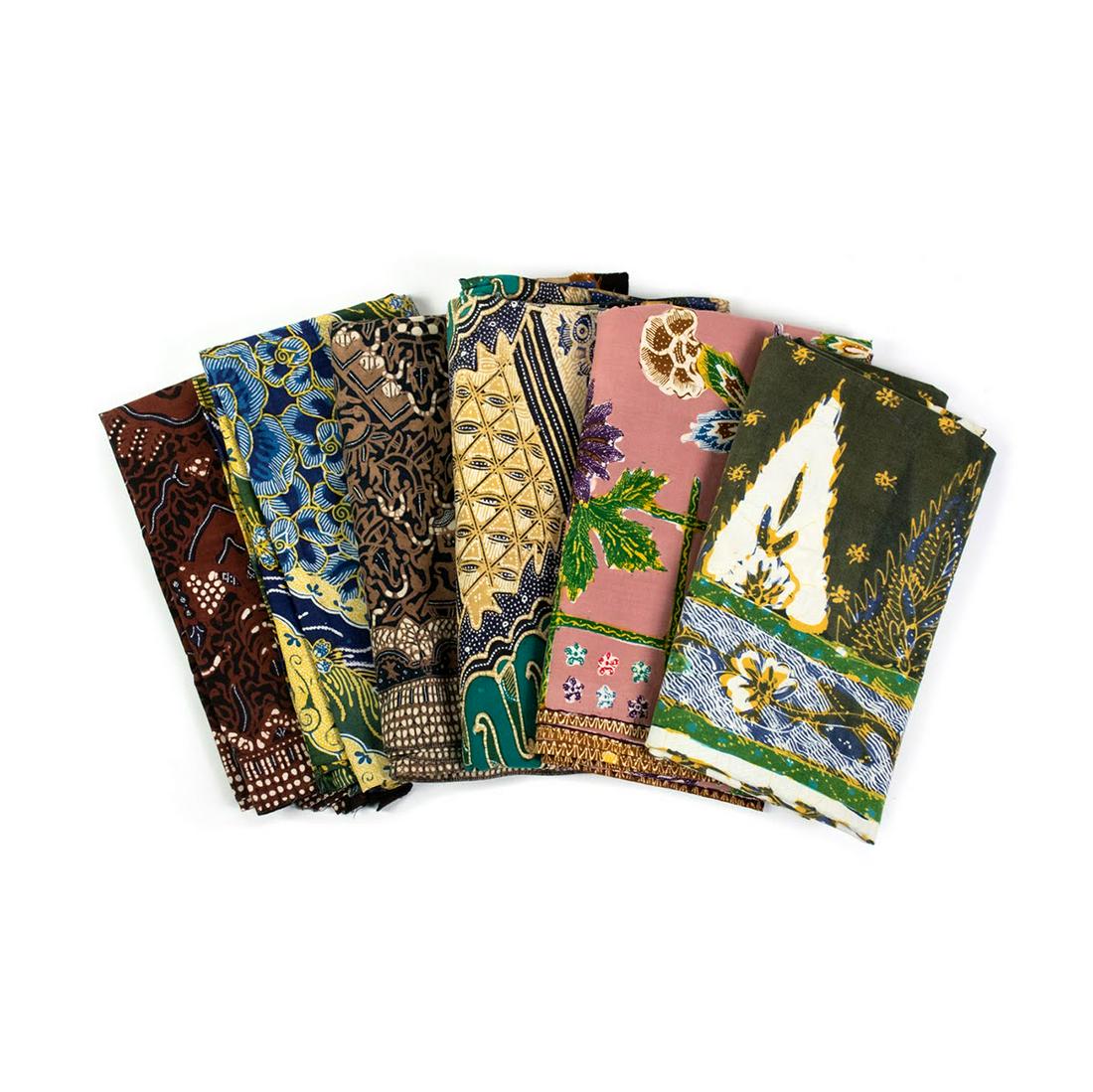 Group of 6 Indonesian Batik Fabric: A group of six Indonesian Bali batik fabric pieces in various colors and designs. These were collected in the 1970-80's for use with Wayang puppets.