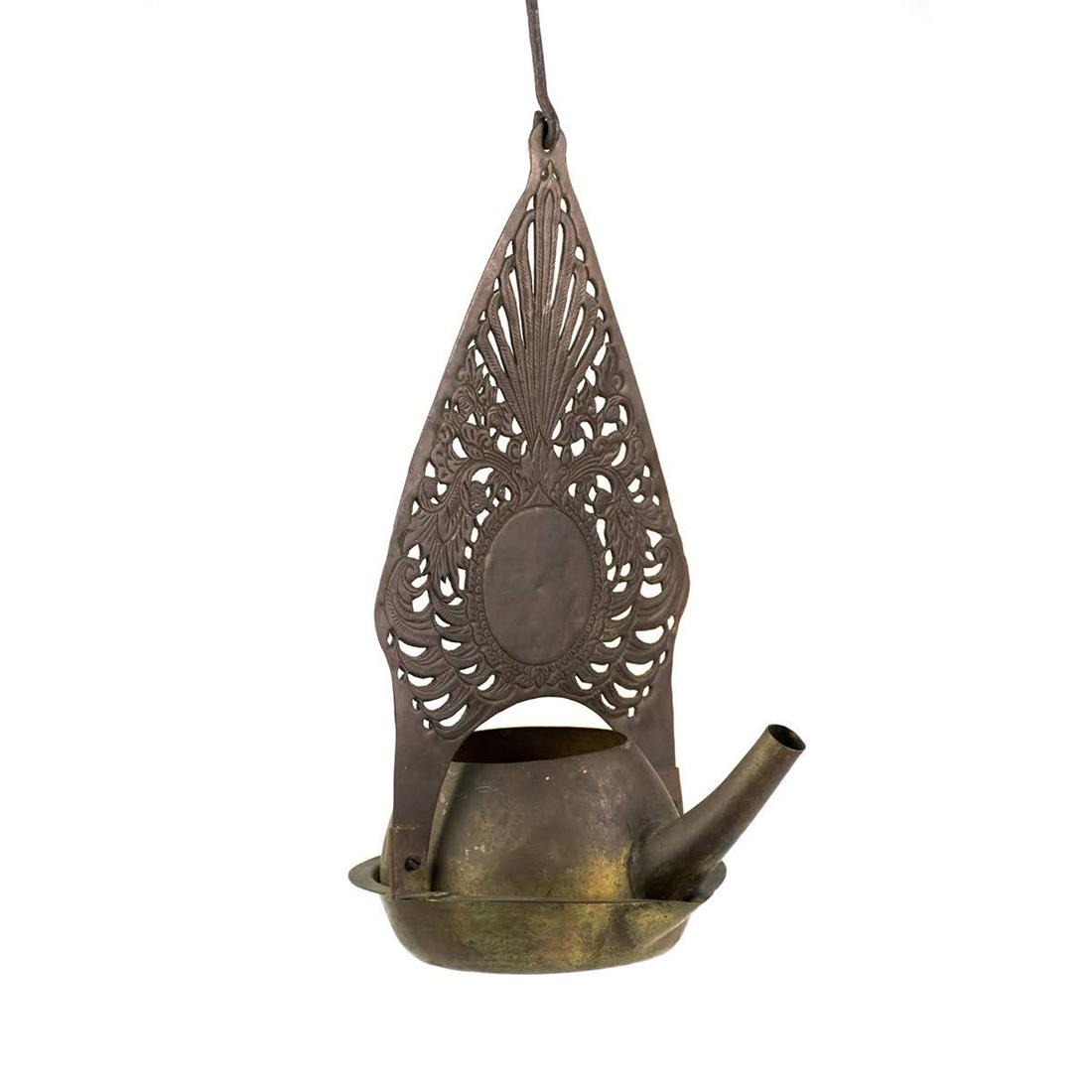 Indonesian Wayang Shadow Puppet Brass Theater Lantern: An Indonesian Bali Wayang shadow puppet theater lantern constructed of brass with hanging handle and tray depicting the tree of life.