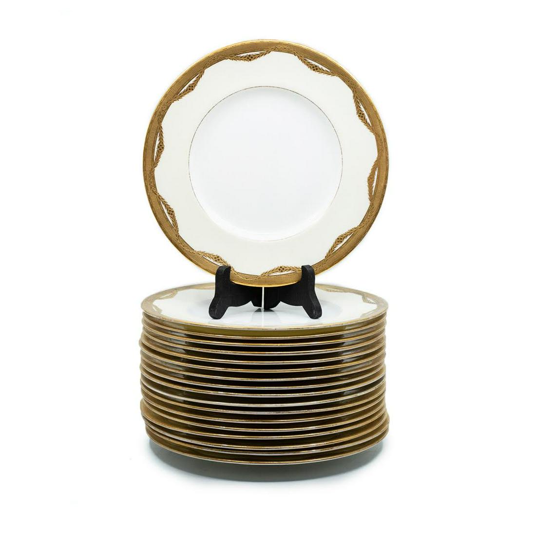Set of 18 Higgins & Seiter Minton Gold Encrusted Plates: A set of 18 Higgins & Seiter Minton gold encrusted plates having gold pattern on edge. Marked on undersides.