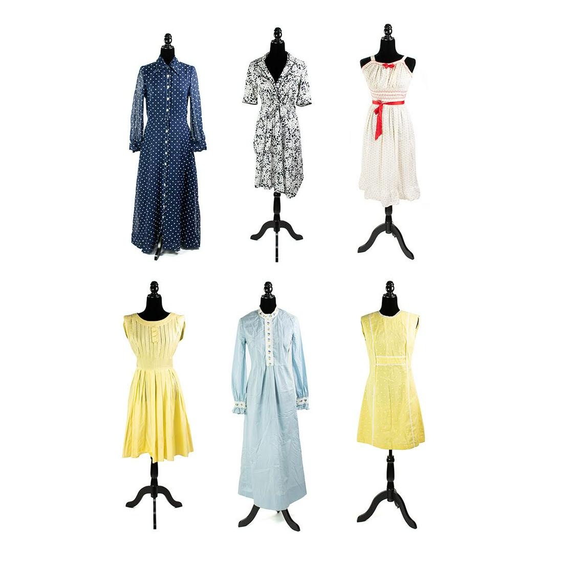 Grouping of Vintage Dresses: A grouping of vintage dresses. This lot includes a navy blue and white polka dot dress by Melissa Lane, a black and white floral wrap dress by Eva for Robert Janan, a black and white houndstooth mod m