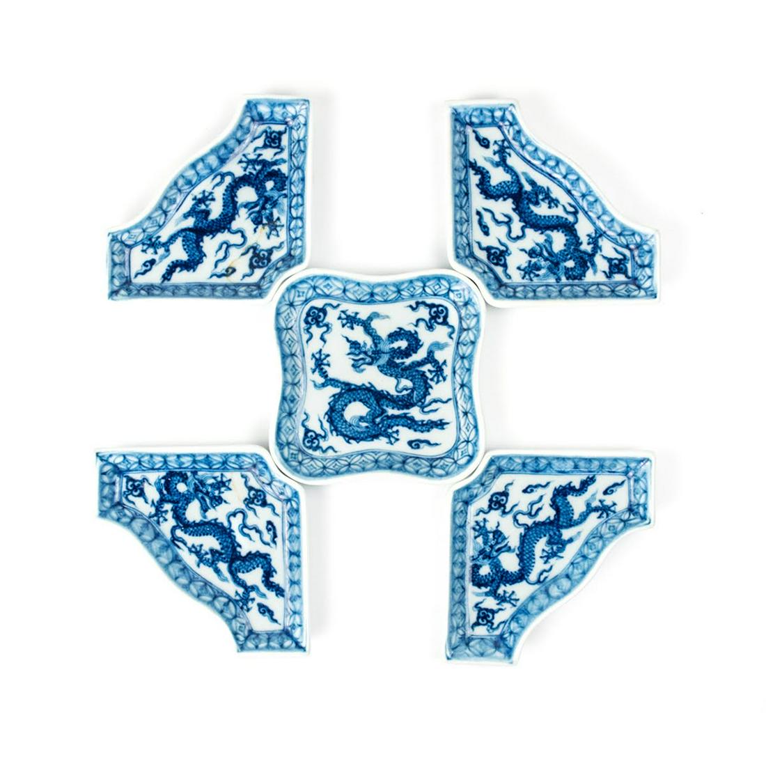 Set of 5 Ming Dynasty Blue and White Plates: A set of Ming dynasty Blue and White serving plates including four possibly bat form plates and one square center plate when arranged depicts the symbol for longevity or life. bianfu , shouzi, qinghua