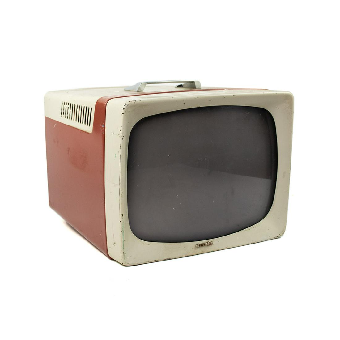1957 General Electric Model 17T026 Television: 1957 General Electric Model 17T026 Television having red and white plastic body with knob adjustments on side. Untested.
