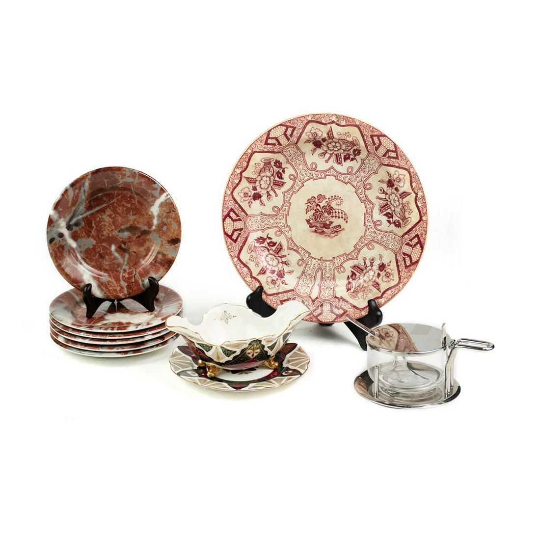 Grouping of Assorted Porcelain Dinnerware: A grouping of assorted porcelain dinnerware including a red floral P. Regout Maastricht Chily, a set of 6 late 20th century Apilco France faux marble plates, a plate and gravy boat set marked Austria,