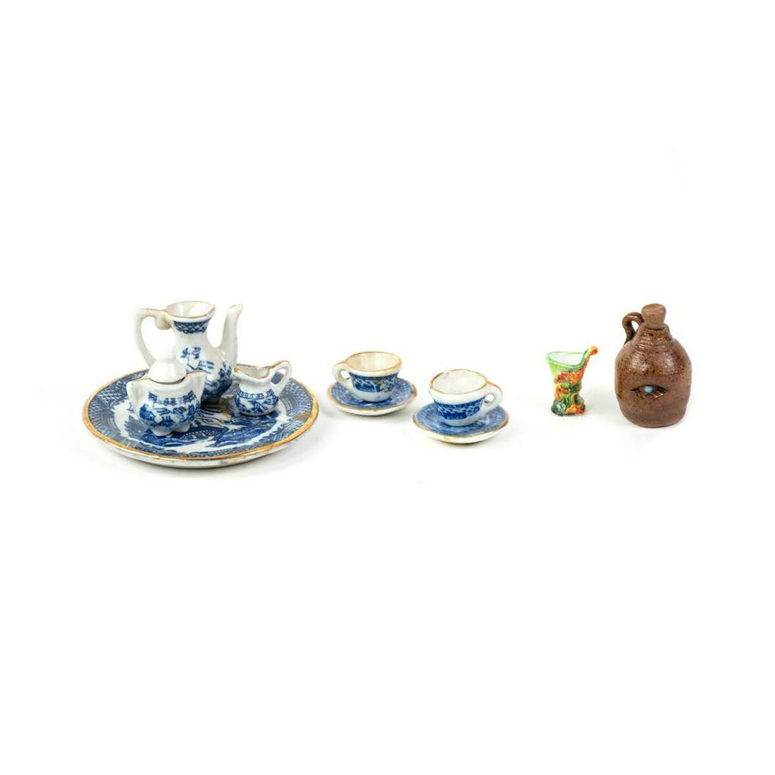 Group Miniature Chinese Blue White and Lalique Pitcher: A group of dollhouse miniature Chinese blue and white porcelain tea set, a earthenware moonshine jug, and a lalique ceramic vase.