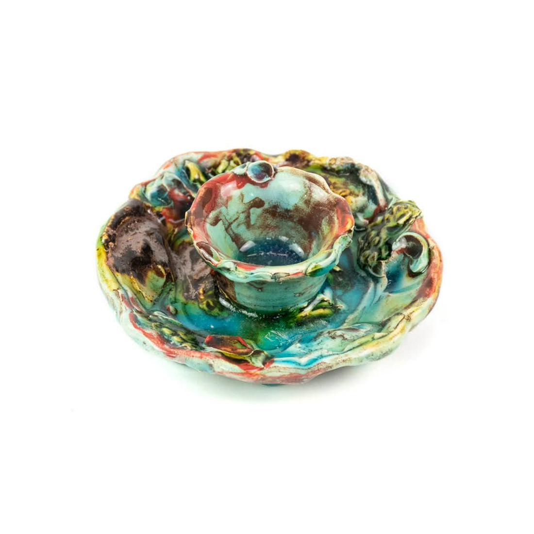 Art Pottery Candlestick Holder by Lisa Orr: A vintage handmade art pottery candlestick holder by Lisa Orr featuring a lively multi-colored glaze throughout. It is unsigned. Informational sheet included.