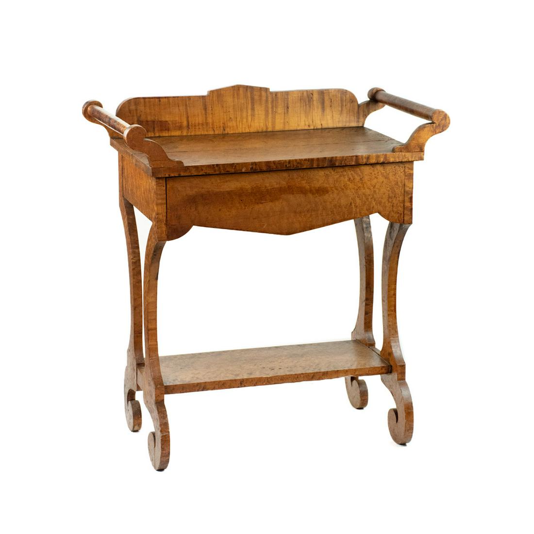 Antique Biedermeier Burl Maple Washstand Cabinet: An antique Biedermeier burl maple washstand cabinet having two dowels on either side with a hidden drawer and lower shelf. It rests atop curved legs and four C shaped feet. Unmarked.