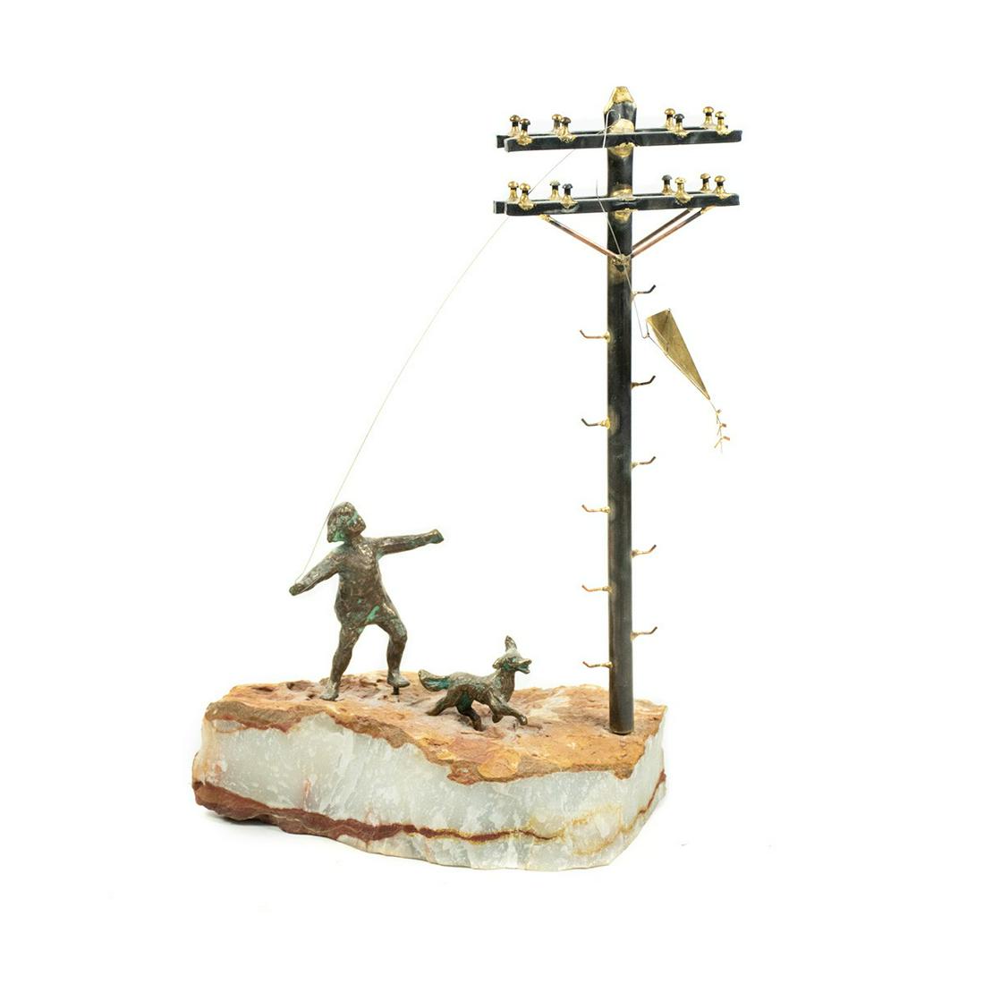 Curtis Jere Original Boy with Kite Bronze Sculpture: Curtis Jere original boy with kite bronze sculpture depicting a young boy with his dog getting his kite stuck on a telephone pole. The bronzes rest atop a stone base. Sticker on underside.