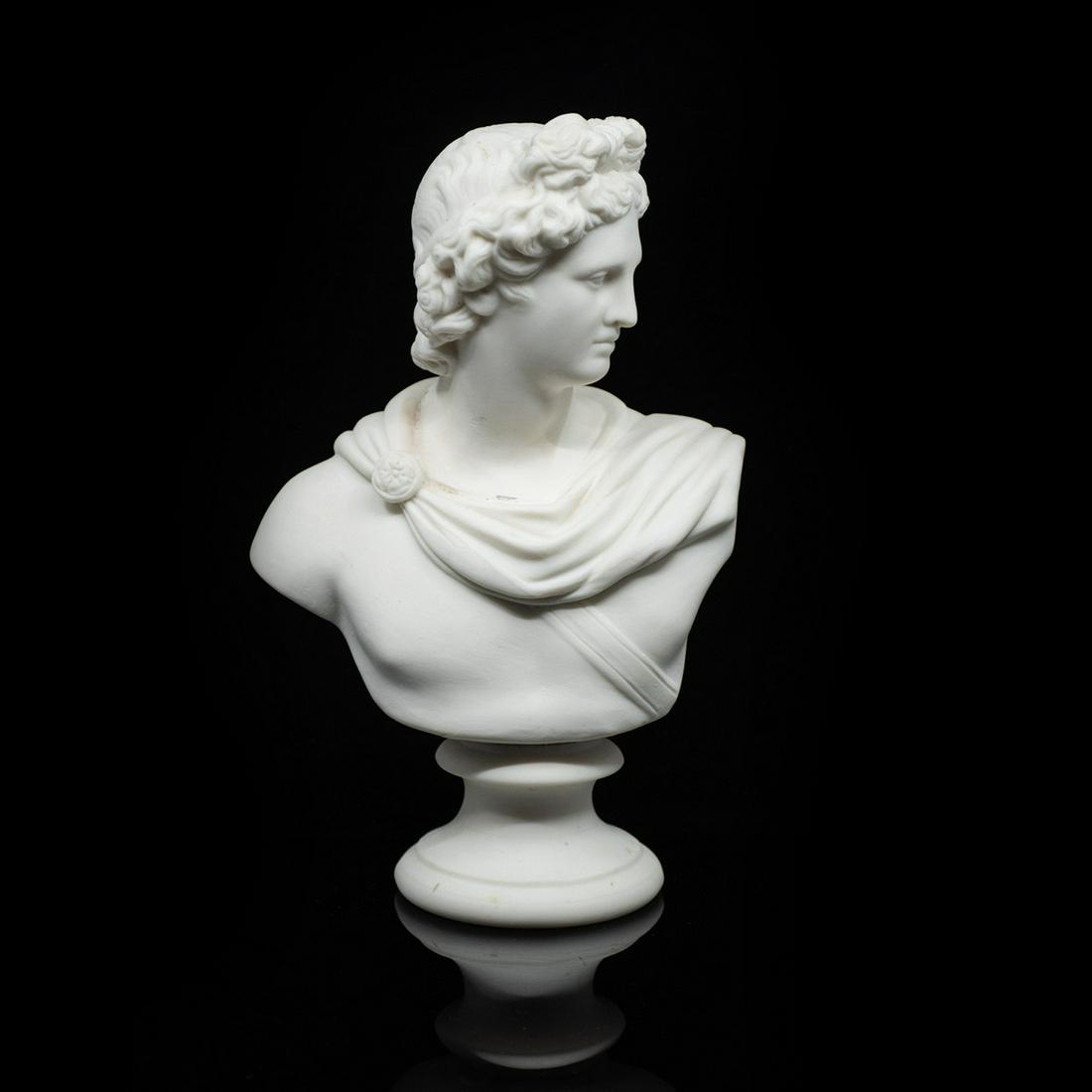 Antique J&T Parian Bust of Apollo After C. Delpech: An antique James and Thomas Bevington parian bust of Greek god Apollo after C. Delpech. It is marked "J&T B 203" on the verso.