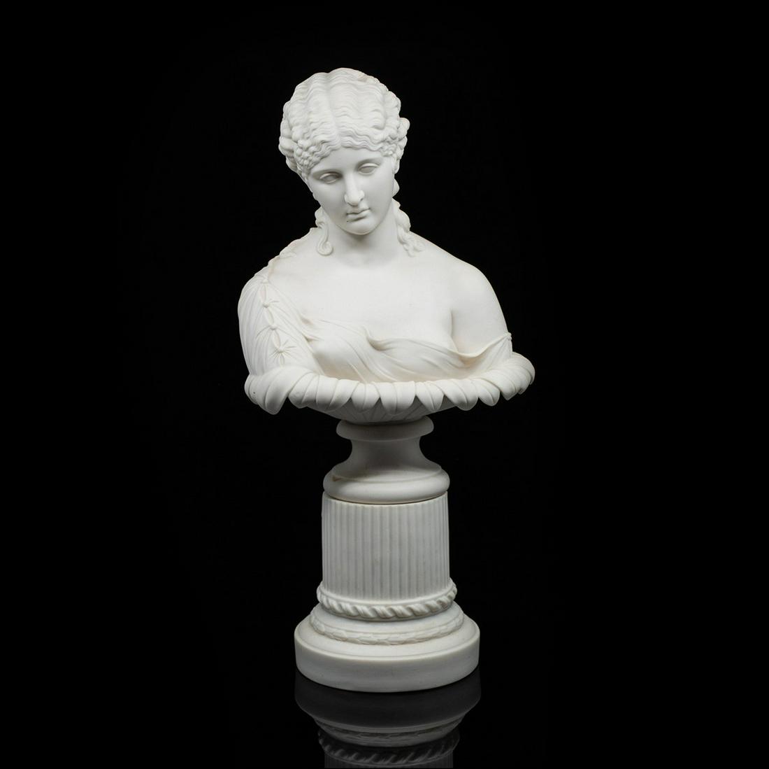 Antique Parian Bust of Aphrodite: An antique parian bust of Greek goddess Aphrodite atop a column base. It is unmarked.