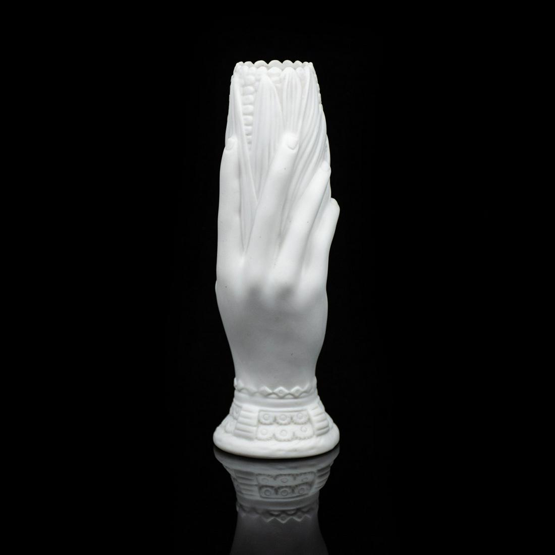 Parian Bud Vase of Woman's Hand Holding Ear of Corn: An antique Parian bud vase of a woman's hand holding an ear of corn. It is unmarked.