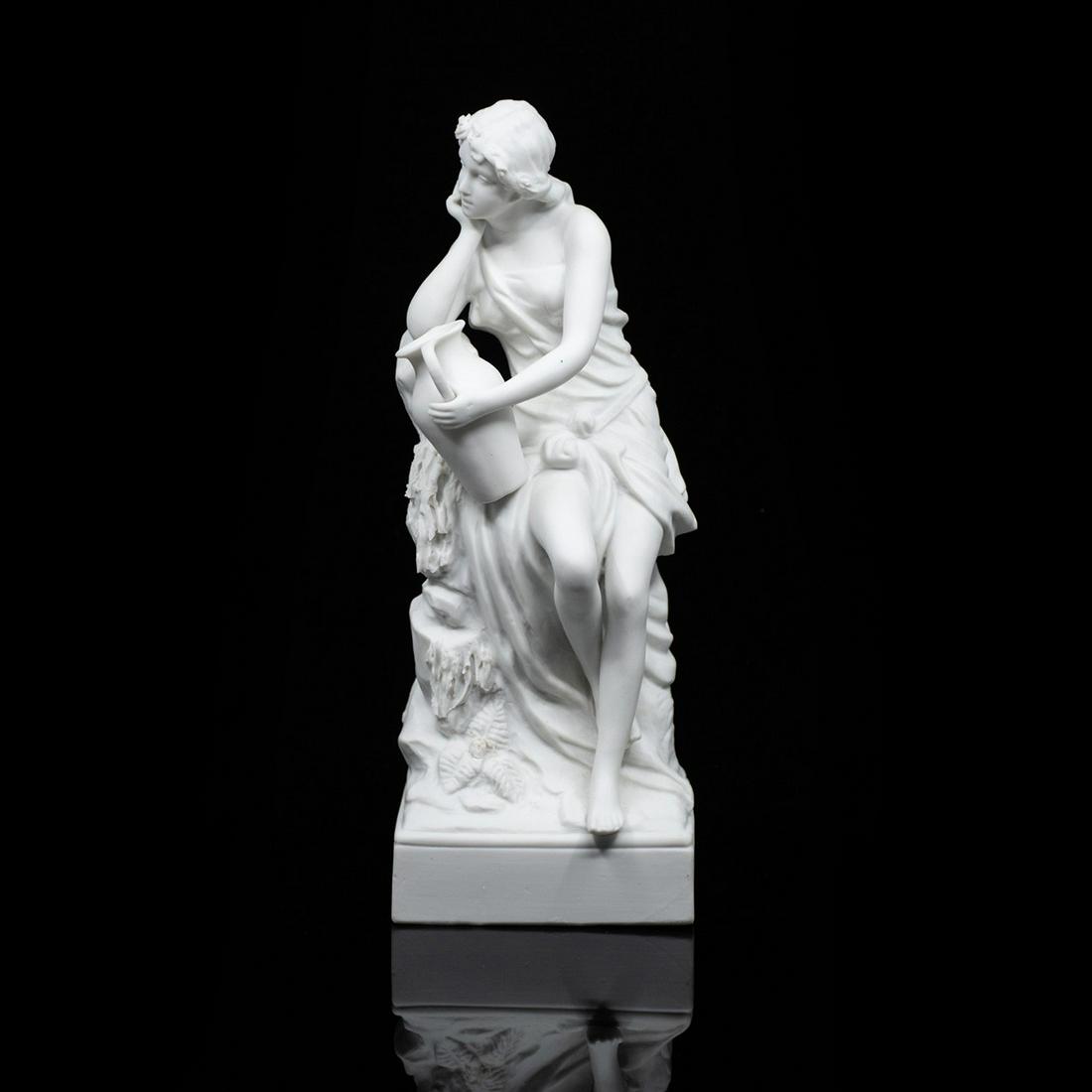 Antique Greco-Roman Parian Statue of Woman: An antique Greco-Roman parian statue of a woman leaning against a rocky wall with a water jug. It is unmarked. Possibly Royal Dux Bohemia