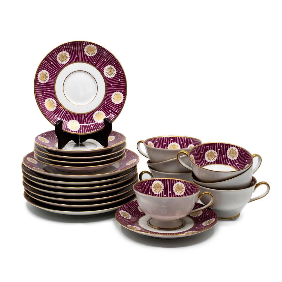 WB Bavarian Red and Gold Floral Tea Cup Set of 20: A set of 21 WB Bavaria luncheon plates and teacups in a red and gold accented pattern with floral motifs. It includes 7 lunch plates, 6 saucers, and 7 tea cups. They are marked on the underside.