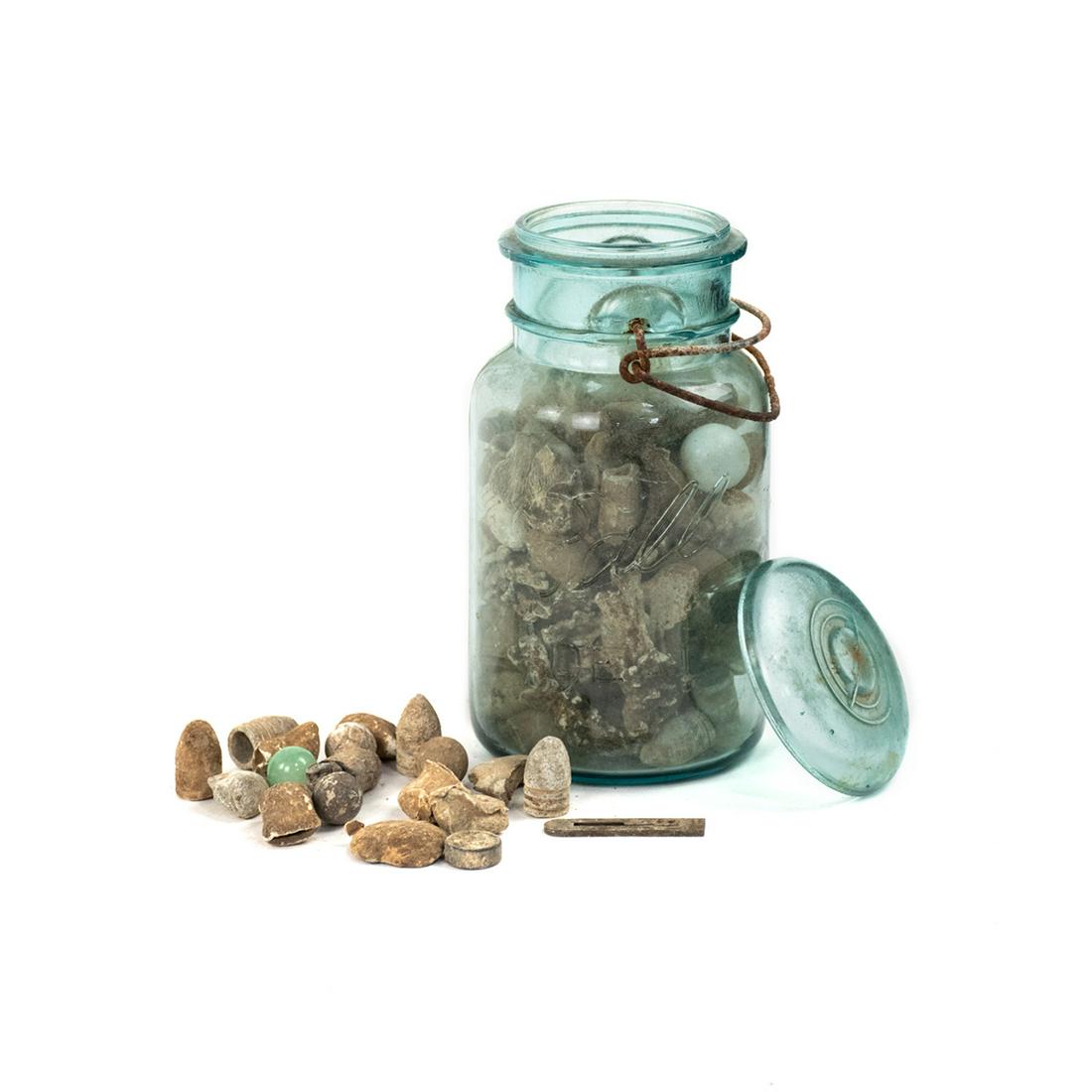 Group of US Civil War Minie Balls and Other Bullets: A group of glass jars of US Civil War minie balls and other bullets. Recovered in the 1990s. Provenance: Larry McCoy - Mobile, AL.