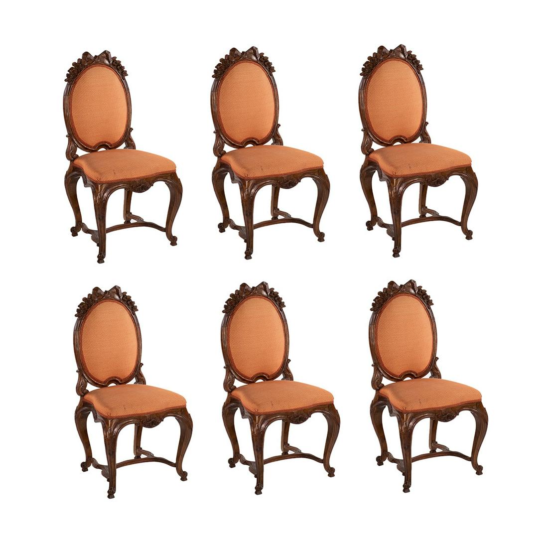 Louis XIV Style Carved Dining Side Chairs - Set of 6: Set of six Louis XIV style dining side chairs having carved bow motif on the backrest with rosettes. They feature orange checkered upholstery and rest atop four cabriole legs. Unmarked.