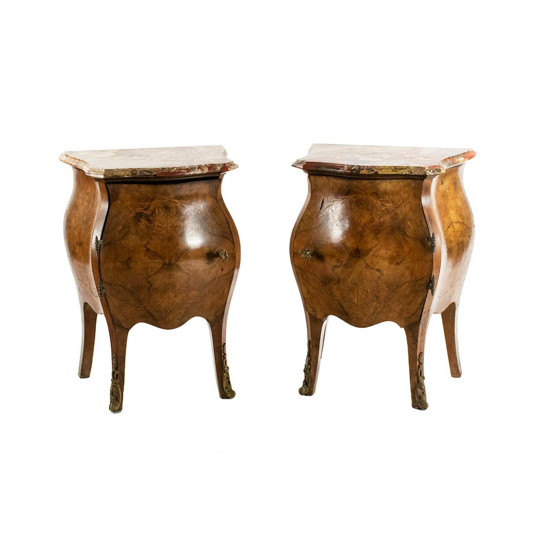 Italian Burlwood Bombe Marble Top Side Tables - a Pair: A pair of Italian burlwood inlaid bombe marble top side tables with one large door opening to a porcelain insert compartment and one interior drawer. They feature orange, brown, and white mottled marb