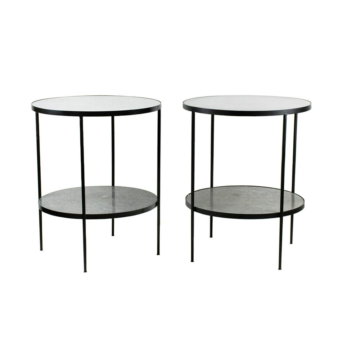 Rivoli Italian Marble & Metal Round Side Tables: A pair of Rivoli modern Italian two tier round marble side tables having mottled white, grey and black marble and metal frame resting atop 4 legs. Unmarked.