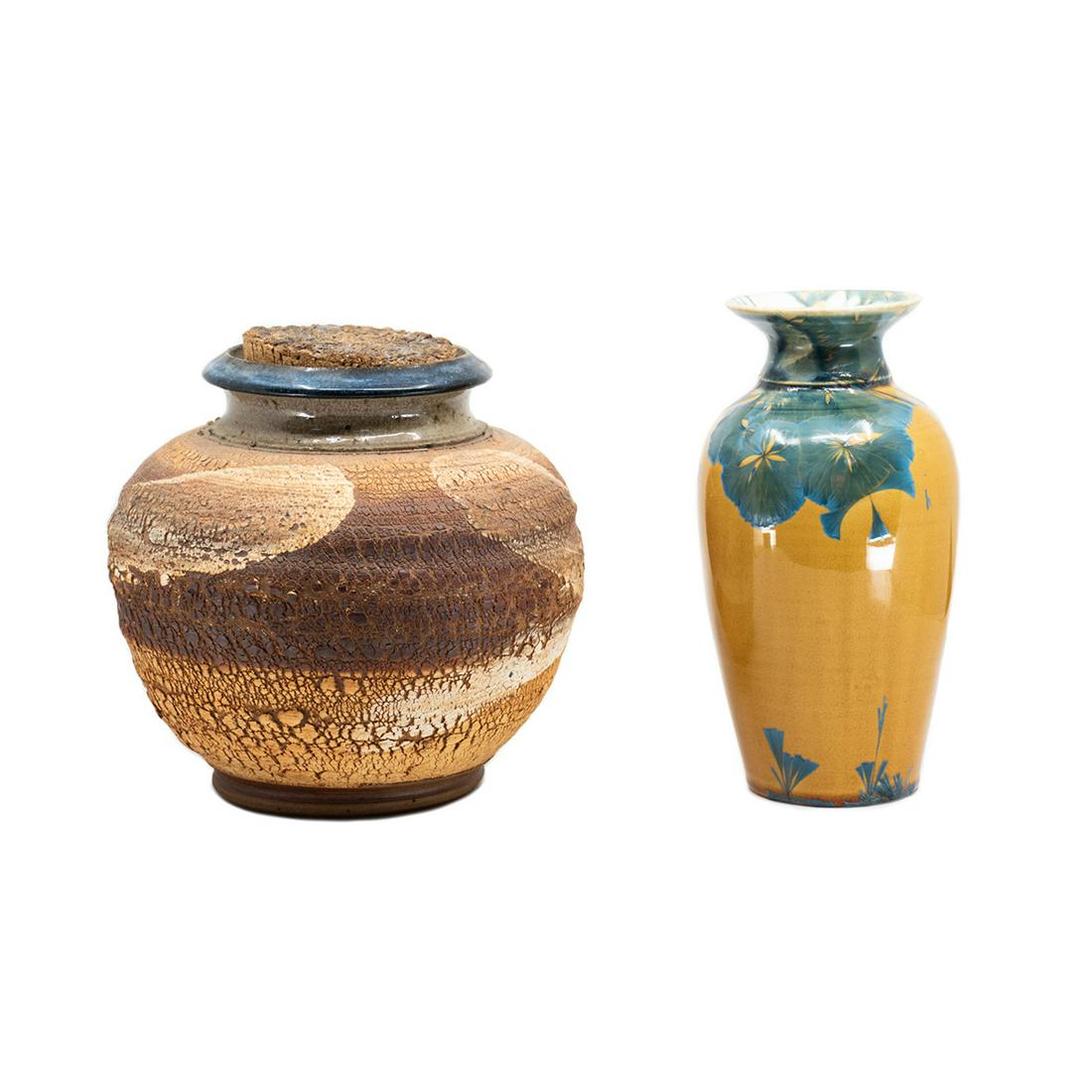 Art Pottery Vase and Jar Including Randall Holland: A grouping of two vintage art pottery pieces. This lot includes a stoneware jar by Randall Holland, which features an earth tone glaze, cracked texturing throughout, and a cork lid. This lot also incl