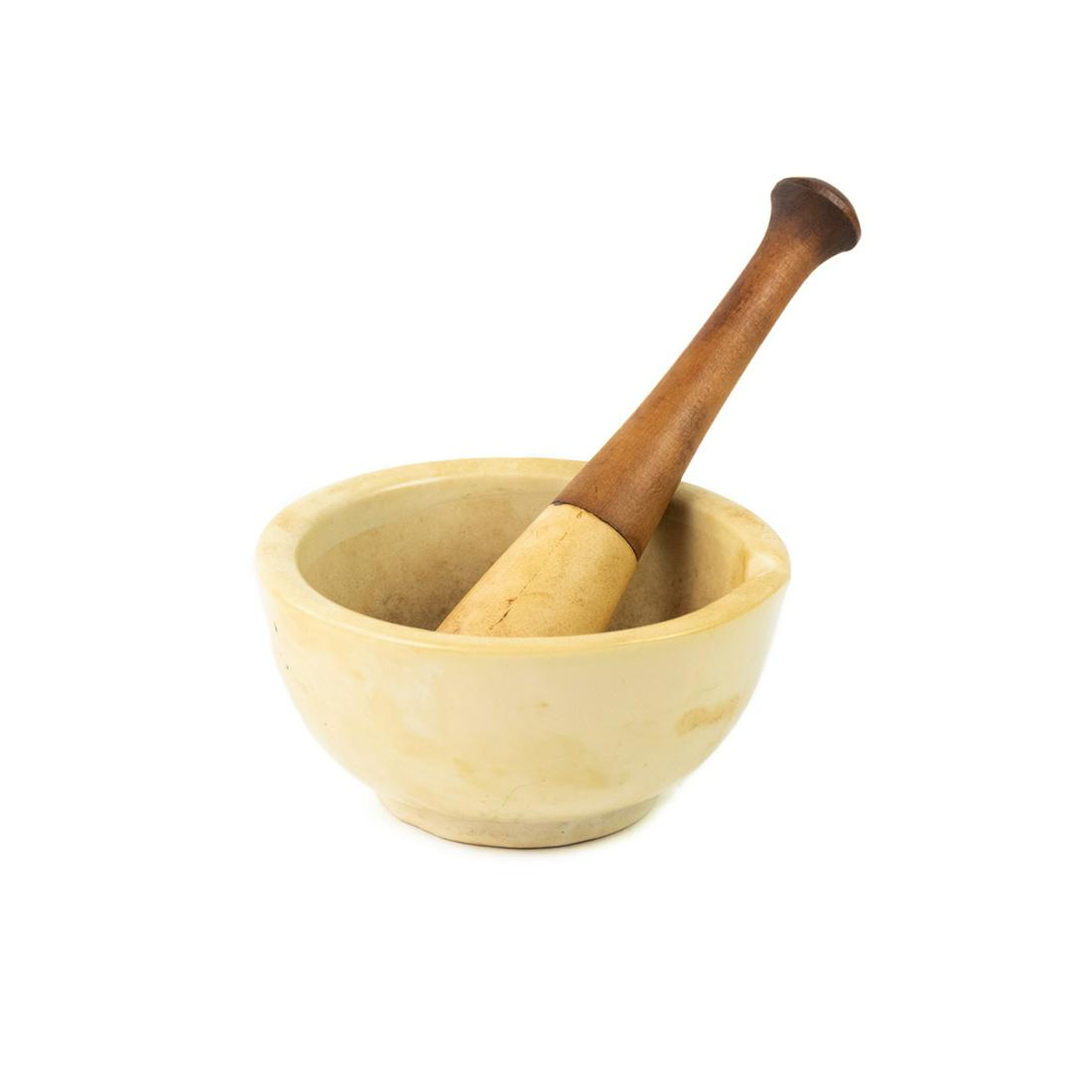 Antique Apothecary Mortar and Pestle Set: An antique apothecary mortar and pestle set. This set is constructed of cream stoneware with the pestle having a wooden handle. It is unmarked.