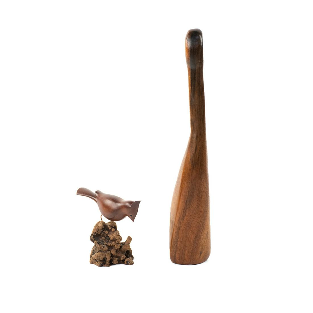 Danish Modern Carved Bird Sculptures: A group of two mid century carved wooden bird sculptures including a abstract form crane and a cardinal atop a piece of burl wood signed Mitchell on underside.