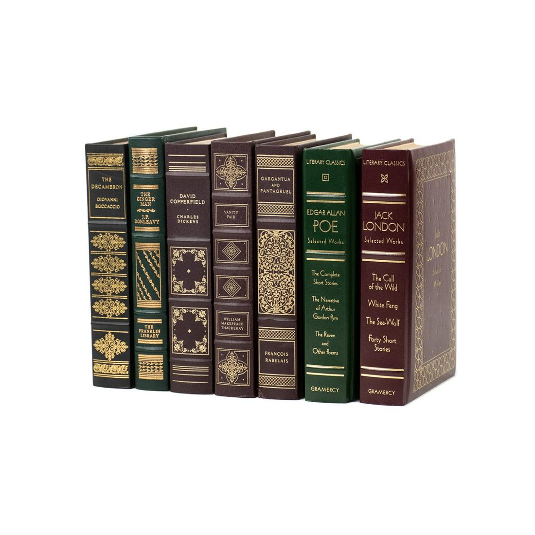 Grouping of 7 Leather Bound Books Including Dickens: A grouping of seven leatherbound hardcover books in blue, green, brown and green including 'The Decameron' by Giovanni Boccaccio, 'The Ginger Man' by J.P. Donleavy, 'David Copperfield' by Charles Dick