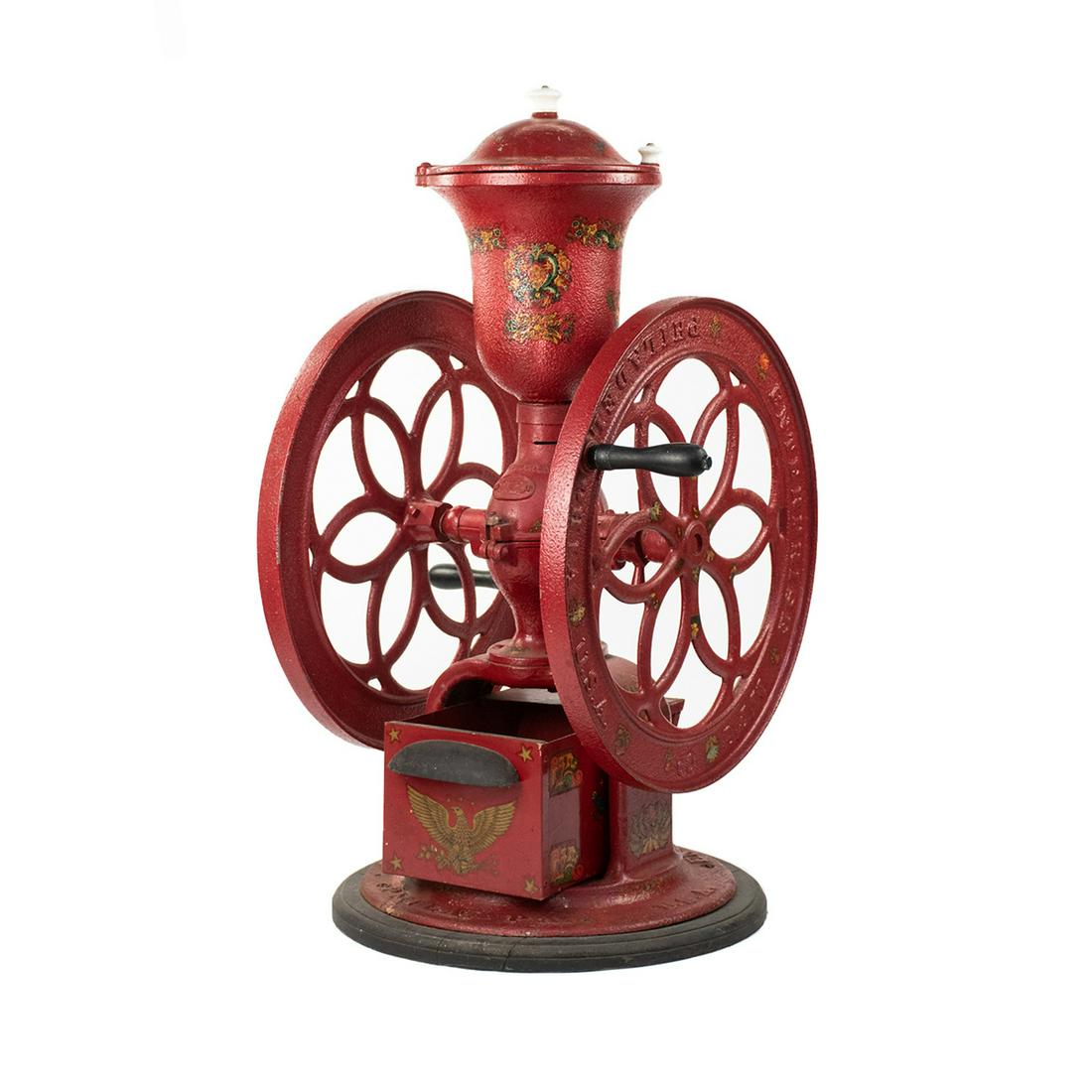 Enterprise No. 712 Commercial Coffee Mill Grinder: An antique commercial two-wheel No. 712 coffee mill grinder by Enterprise having original red painted cast iron body decorated with colorful floral and foliate designs, and a golden eagle motif on the