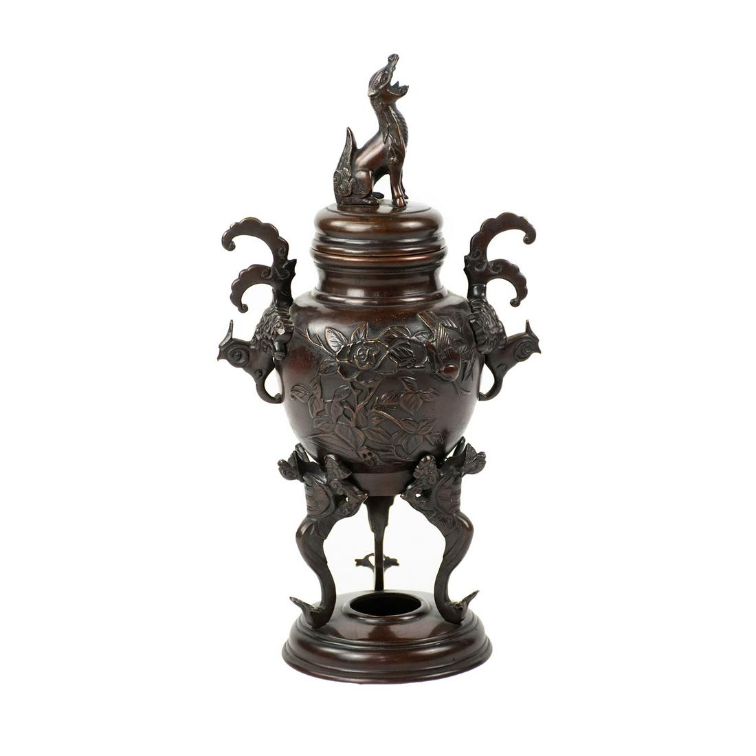 19th C Meiji Japanese Bronze Censer Burner: A 19th century Meiji Japanese bronze censer or koro featuring an urn form with embossed floral and bird designs to the body, bird of paradise motif handles on both sides, and a round lid decorated wit