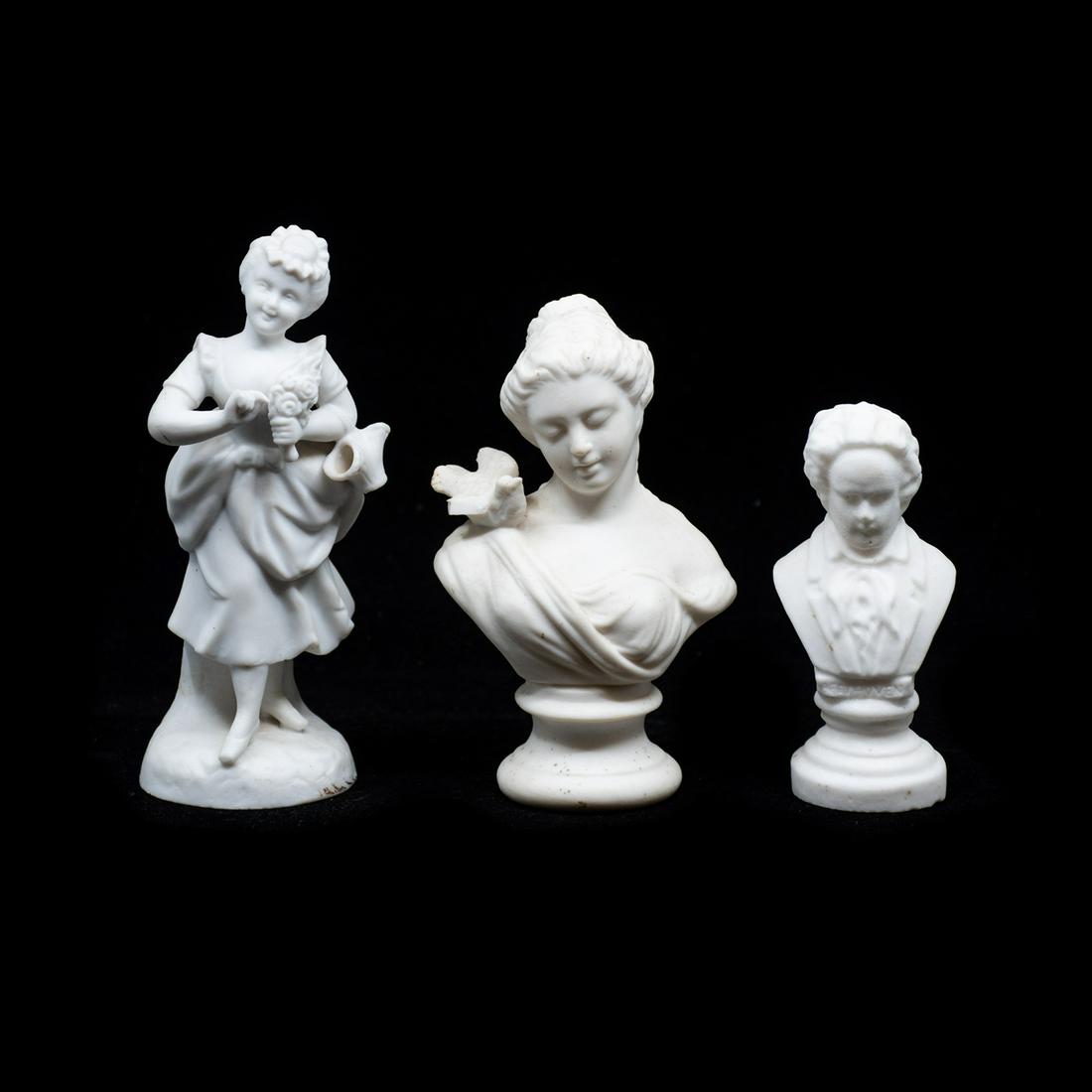 19th C. Parian Bisque Sculptures: A grouping of three 19th century antique parian bisque porcelain sculptures, including a young girl holding a bouquet of flowers, a bust of a woman with a bird on her shoulder, and a bust of a man. Th