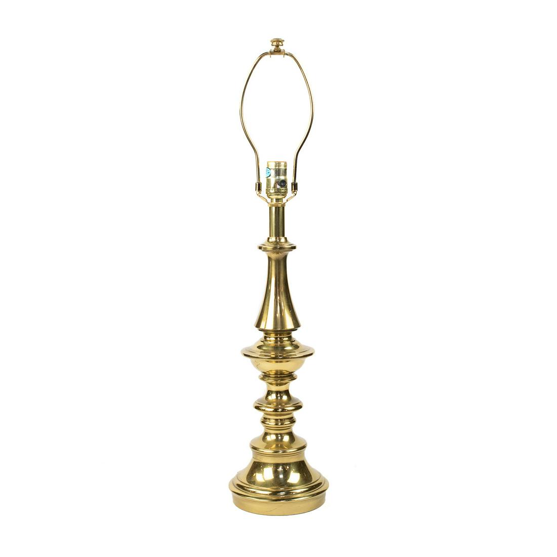 Stiffel Brass Table Lamp: A vintage brass table lamp by Stiffel of Chicago, Illinois featuring a segmented column form, tiered round base, and rotary switch. It is labeled on the underside and numbered "5503". Original tag inc