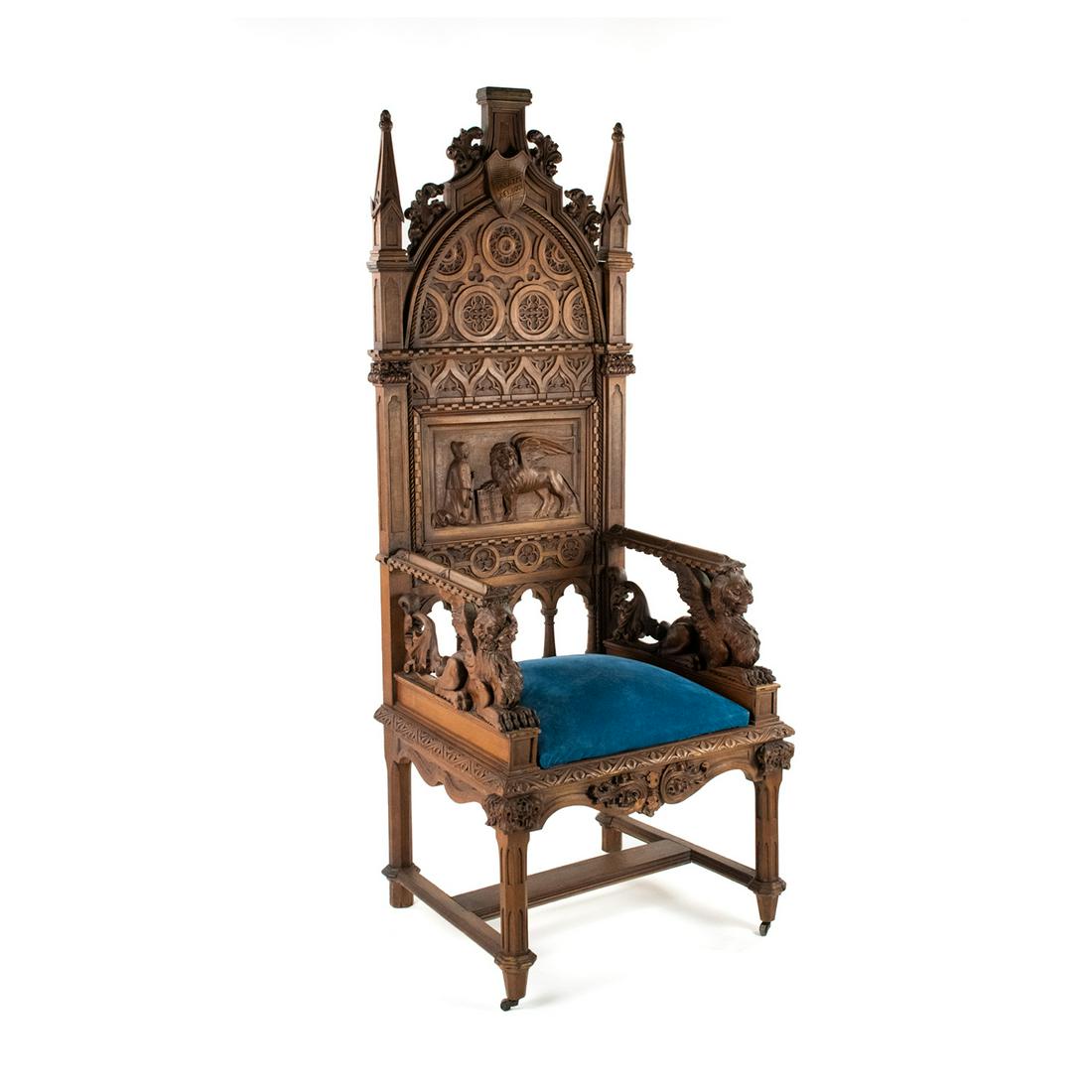 Italian Renaissance Style Doge Palace Throne Chair: An Italian Renaissance style Venetian Doge Palace carved wood throne chair featuring a heavily carved frame and a blue velvet upholstered seat. The back rest is decorated with a depiction of the Lion
