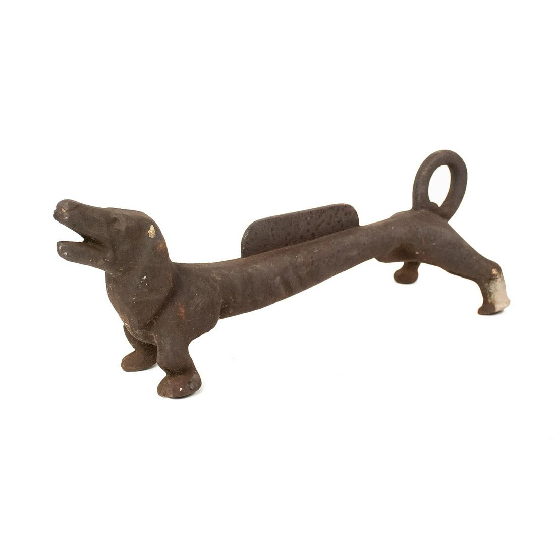Antique Cast Iron Dachshund Boot Scraper Door Stop: An early 19th century antique cast iron dachshund weiner dog boot scraper door stop. It is unmarked.