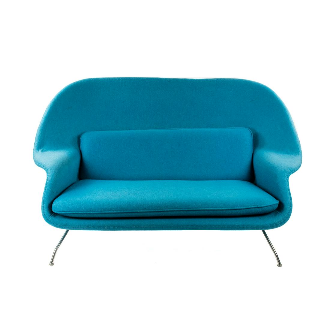 Knoll Eero Saarinen Blue Womb Settee: An Eero Saarinen Womb Settee having Aegean Boucle upholstery with fiberglass molded shell cushion with foam and chromed steel tube frame. Label on underside.