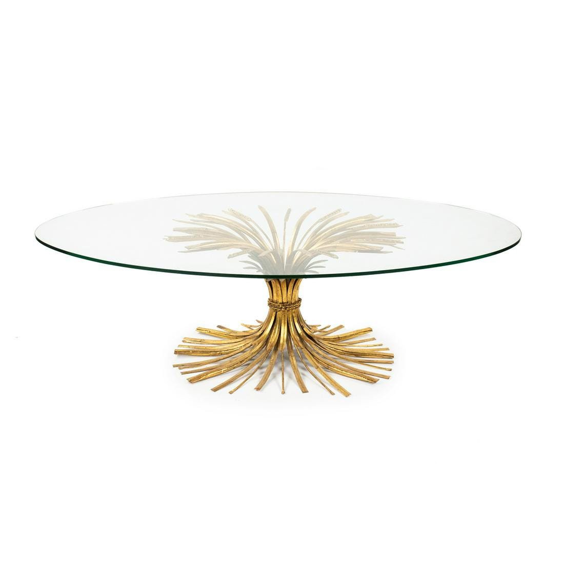 Coco Chanel "Sheaf of Wheat" Oval Gilt Coffee Table: A Coco Chanel "Sheaf of Wheat" oval coffee table having a sculpted gold gilt iron wheat sheaf form base and a heavy beveled edge glass top. It is unmarked.