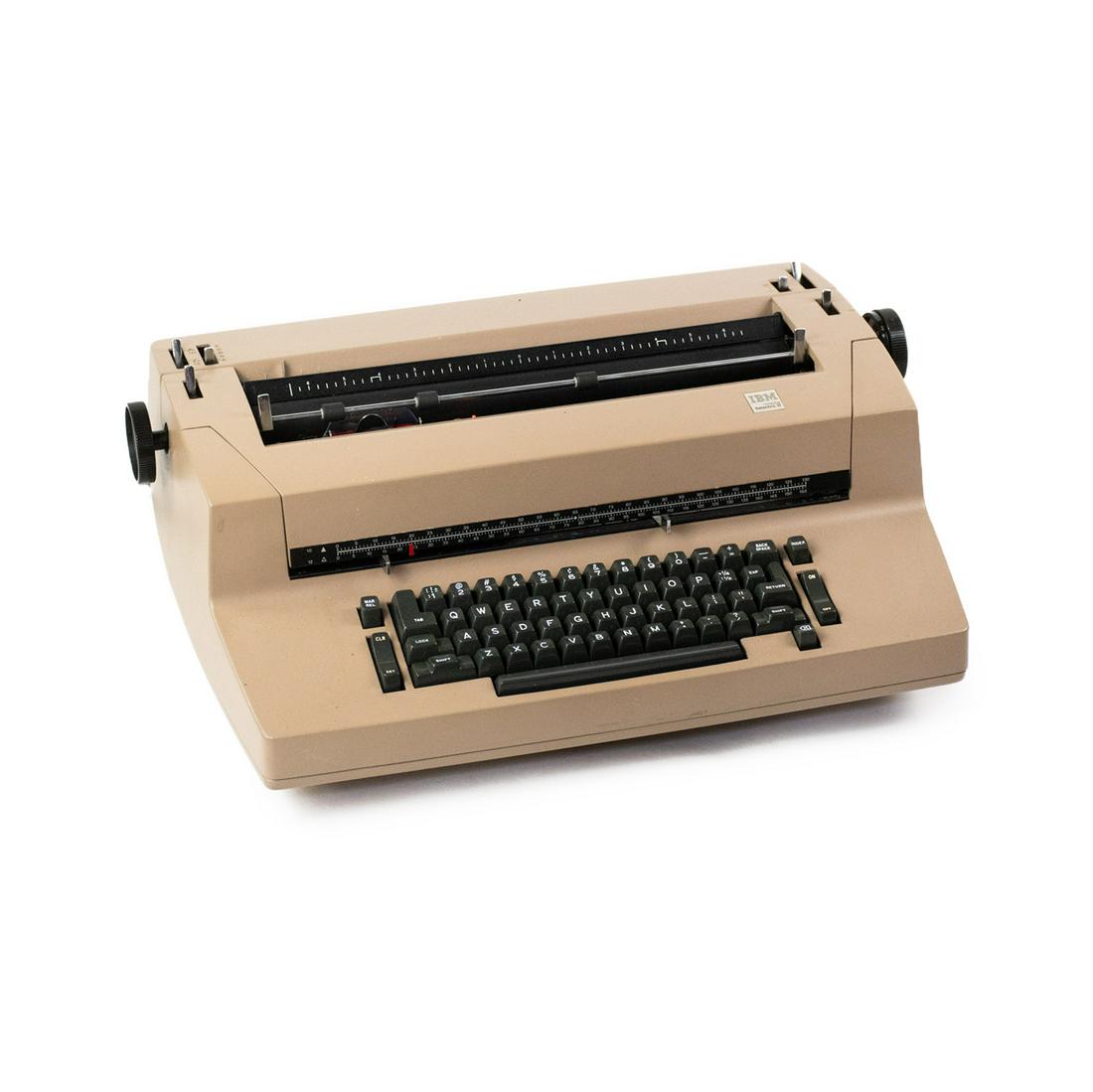 IBM Service Selectric II Correcting Typewriter Machine: A vintage IBM Service Selectric II Correcting Typewriter Machine in a tan brown color with black carrying case. Marked.