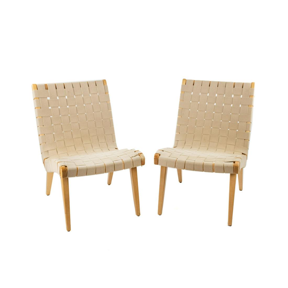 Pair of Jens Risom for Knoll Studio Lounge Chairs: A Pair of Jens Risom for Knoll Studio lounge chairs having maple wood frames with stretched flax color cotton strap webbing for the seat and backrest. Each chair is marked on underside.
