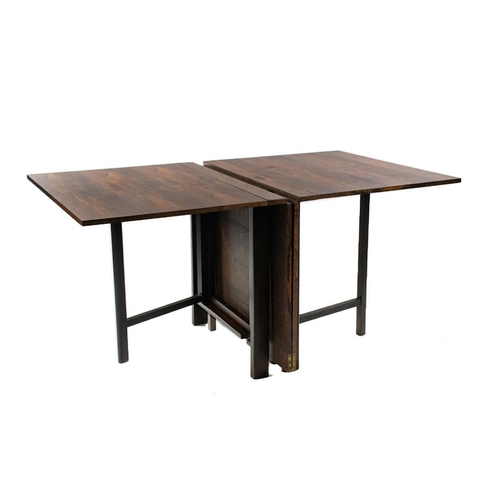 Bruno Mathsson 'Maria' Rosewood Extension Dining Table: A Bruno Mathsson (Danish) â€˜Maria” rosewood foldable extension dining table having adjustable gate legs and rosewood veneer over teak wood frame. It extends from nine inches when closed to