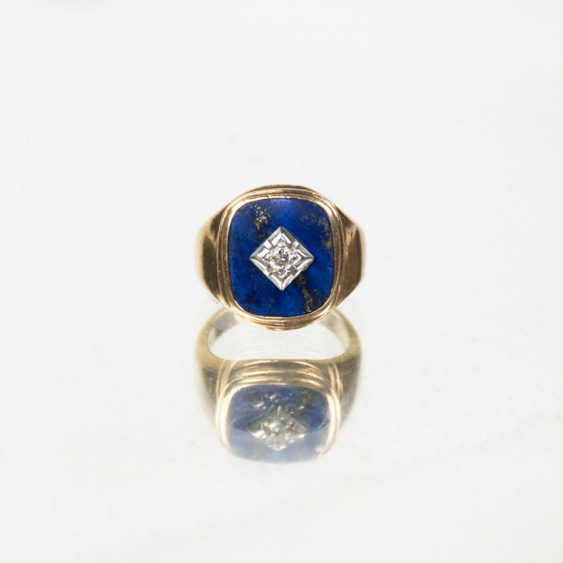 10K Yellow Gold Lapis Lazuli and Diamond Ring: A 10 karat yellow gold lapis lazuli and diamond men's ring weighing 13.2 grams in total. It is marked "10K" on the interior of the band. Ring Size: US 8.5. Weight: 13.21 grams.Lapis specifications - O