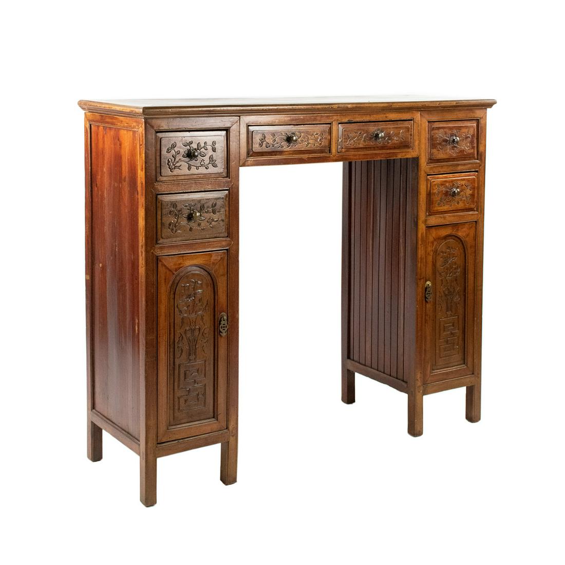Qing Dynasty Chinese Elmwood Four Part Pedestal Desk: A Chinese Qing Dynasty four section pedestal writing desk having two column uprights with two upper drawers and a lower cabinet with a center bridge having two drawers and removable top. It is constru