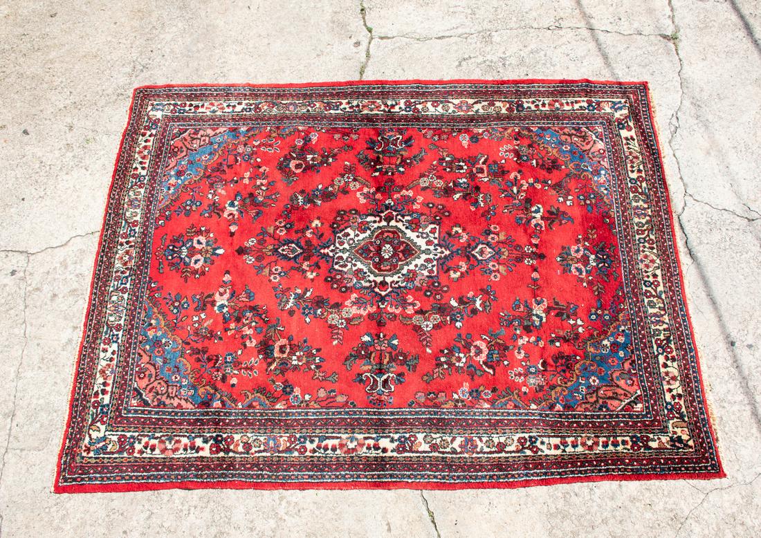 Persian Nahavand Red Wool Pile Area Rug: A Persian/Iranian Nahavand 100% wool pile area rug with red, blue, and white floral designs and short fray ends. Tag attached.