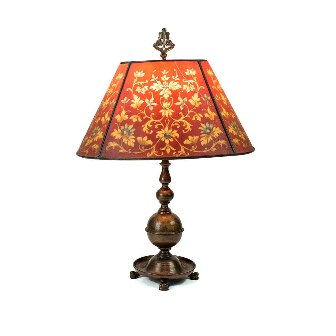 Antique Handel Reverse Painted Brass Lamp: An antique original Handel brass table lamp with signed 'Handel' reverse painted glass yellow floral pattern shade and ornate brass finial. Shade is marked along bottom edge.