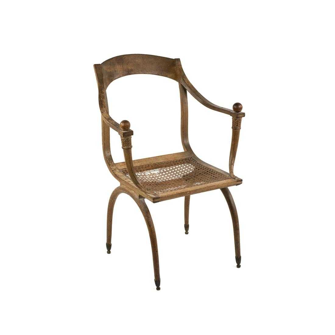 Early 19th C Fauteuil Armchair by Jean-Joseph Chapuis: A circa 1805 original fauteuil armchair by Jean-Joseph Chapuis (French, 1765-1864) having curved toprail and arms with ball finials on each side above a caned woven seat over curved bentwood legs that