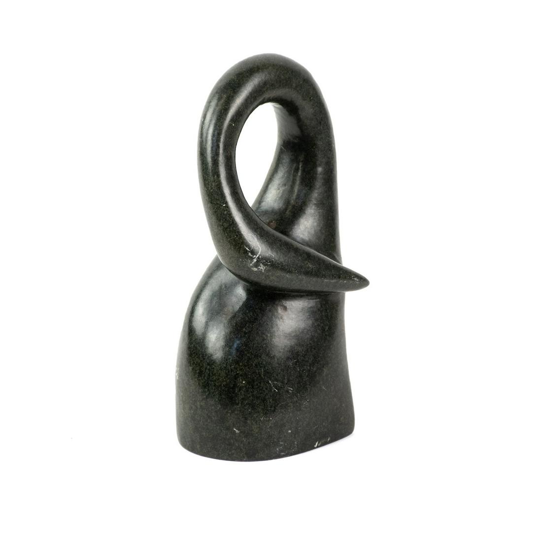 Modernist Carved Black Granite Swan Sculpture: A modernist carved black granite swan sculpture featuring an abstract fluid form. It is unsigned.