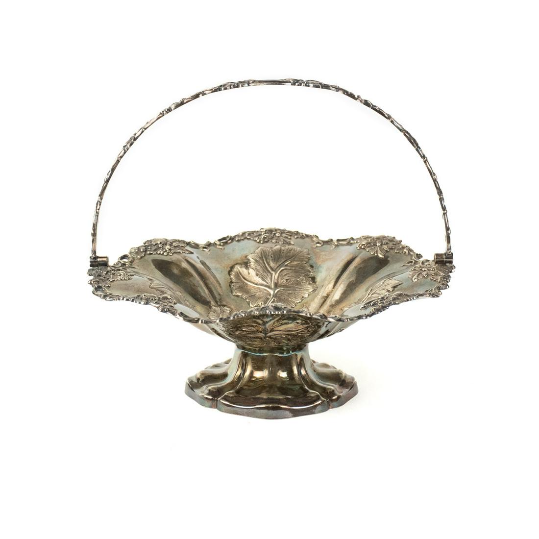 Walker & Hall Sheffield Silver Bon Bon Basket: A Walker & Hall Sheffield England silverplate vine possibly holly berry motif basket with ornate handle. Stamped on underside Walker & Hall Sheffield England and numbered 51024.
