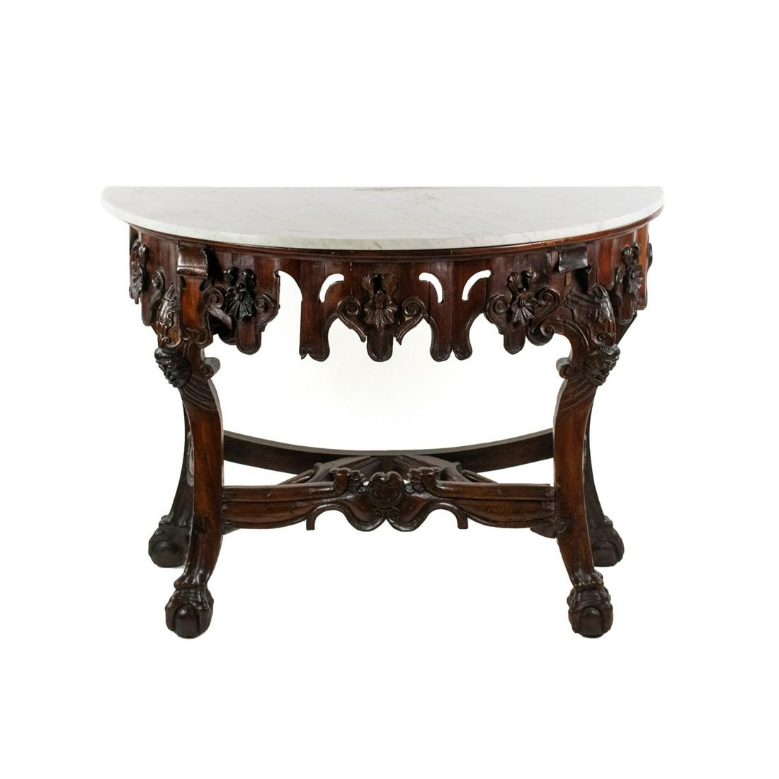 19th C Italian Marble Top Demilune Console Table: 19th century Italian carved wood demilune console table having white marble top with carved faces on each leg and ball and claw feet with carved peacocks along the lower stretcher. Shipping Atlanta Au