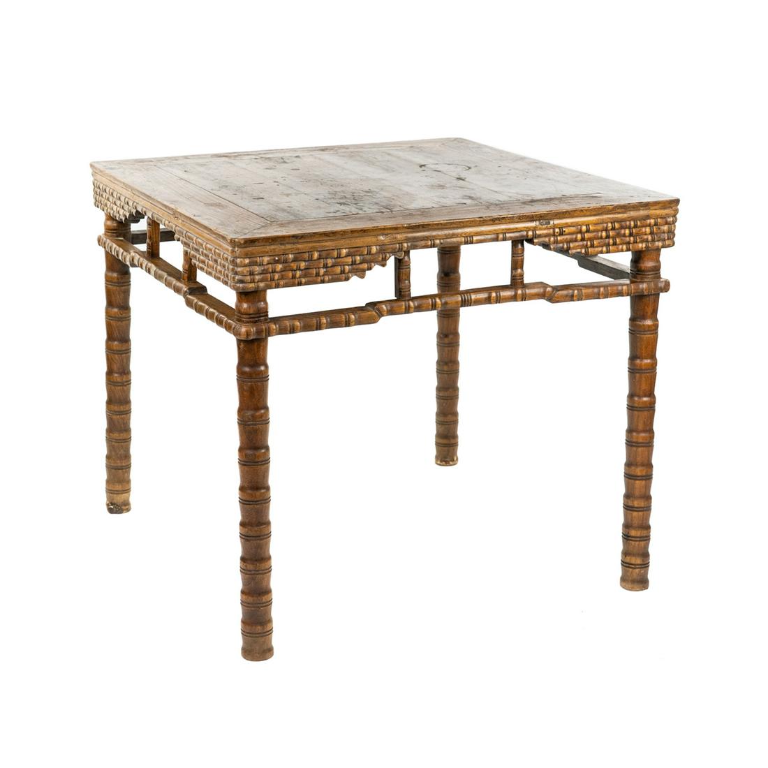 Antique Chinese Carved Square Table: An antique chinese carved faux bamboo elm wooden table having simple apron accent wood trim and carved "bamboo" pattern legs and top. SHIPPING Atlanta Auction Gallery will not ship this lot in house.