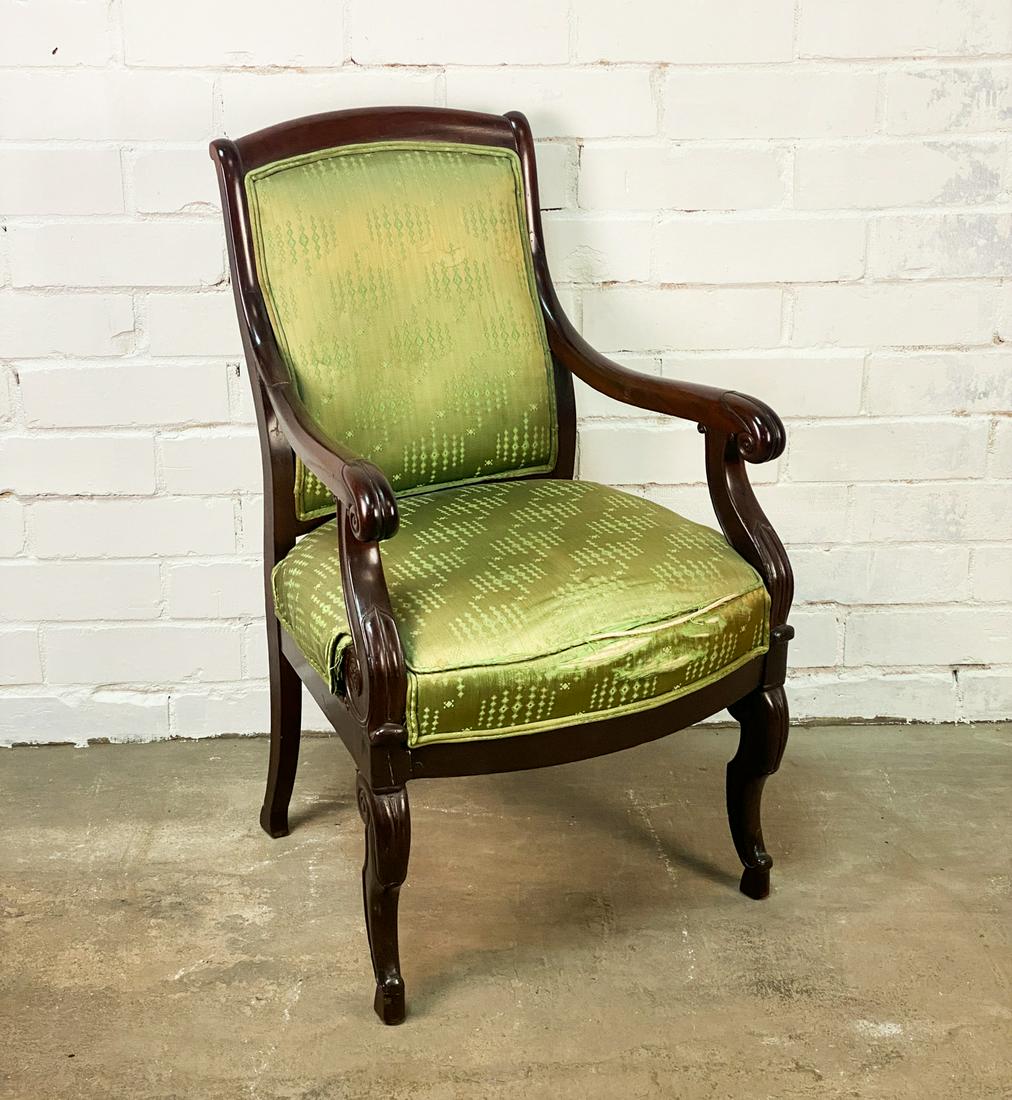 Empire Style Mahogany Armchair: A mahogany Empire style carved green contemporary upholstery armchair. SHIPPING Atlanta Auction Gallery will not ship this lot in house. The buyer is responsible for arranging White Glove delivery, in