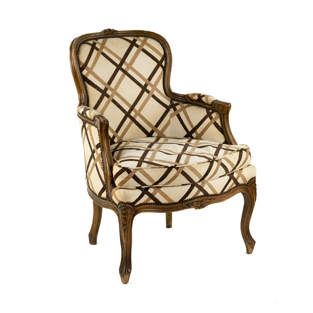 Louis XV Style Carved Upholstered Armchair: A vintage Louis XV style carved walnut frame and contemporary upholstery armchair with striped brown and tan pattern fabric. Seat height: 19" SHIPPING Atlanta Auction Gallery will not ship this lot in